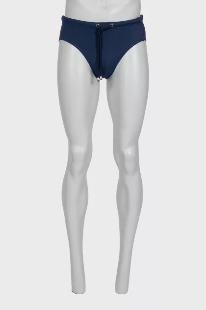 Men's blue swimming trunks with tag