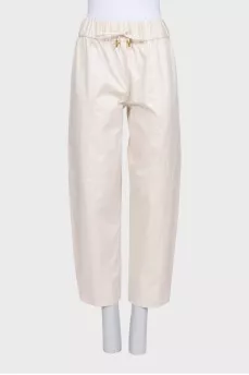 Beige straight-leg trousers with elastic waistband
