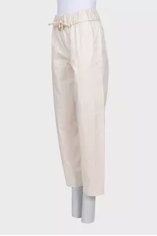 Beige straight-leg trousers with elastic waistband