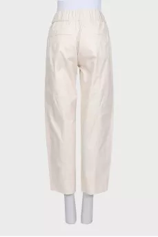 Beige straight-leg trousers with elastic waistband