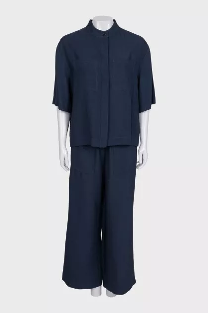 A suit of straight trousers and a shirt