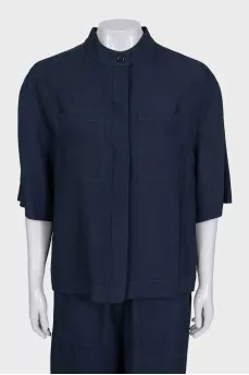 A suit of straight trousers and a shirt