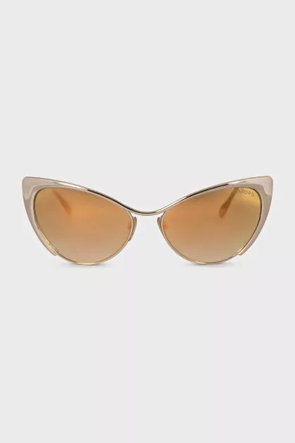Cat eye sunglasses with gold lenses