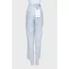 Sheer wide-leg trousers with tag