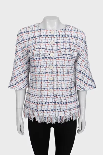Straight jacket decorated with fringe