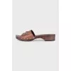 Leather clogs with wooden soles