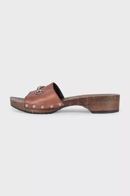 Leather clogs with wooden soles