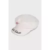 Kepi with a visor decorated with embroidery