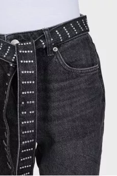 Cropped jeans with a rhinestone-embellished belt