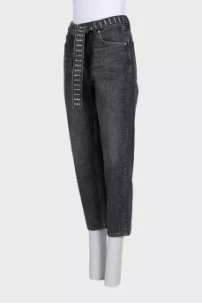 Cropped jeans with a rhinestone-embellished belt