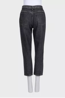 Cropped jeans with a rhinestone-embellished belt