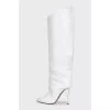 White leather boots with pointed toes