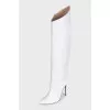 White leather boots with pointed toes