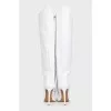 White leather boots with pointed toes