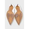 White leather boots with pointed toes
