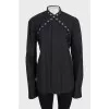 Black shirt decorated with eyelet ties