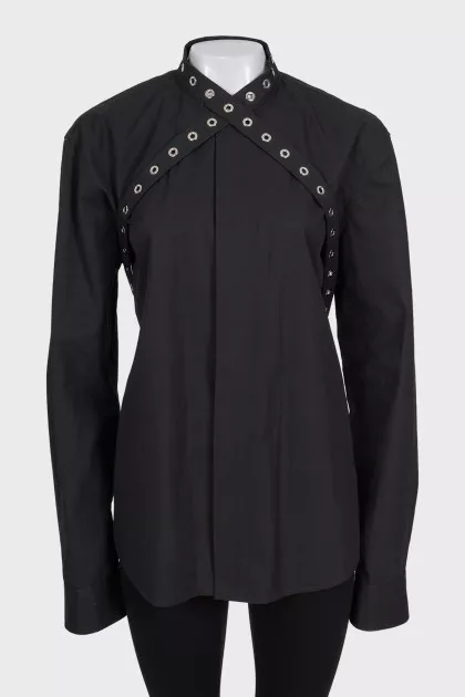 Black shirt decorated with eyelet ties