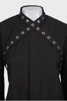 Black shirt decorated with eyelet ties