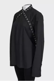 Black shirt decorated with eyelet ties