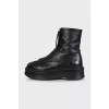 Black leather zip-up boots