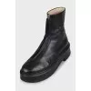 Black leather zip-up boots
