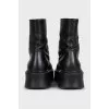 Black leather zip-up boots
