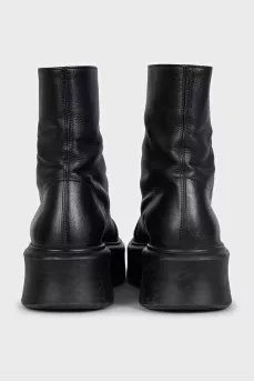 Black leather zip-up boots
