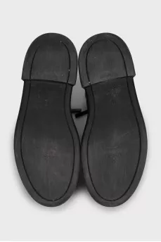 Black leather zip-up boots