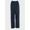 Blue suit with striped trousers