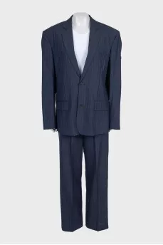 Blue suit with striped trousers