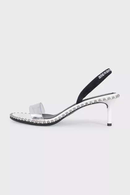 Slipper-heeled sandals with silver embellishments