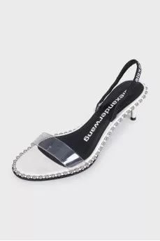 Slipper-heeled sandals with silver embellishments