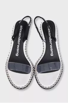 Slipper-heeled sandals with silver embellishments