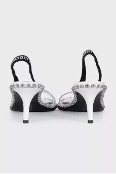 Slipper-heeled sandals with silver embellishments