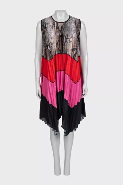 Pleated dress with an asymmetrical hem