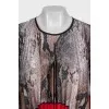 Pleated dress with an asymmetrical hem