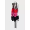 Pleated dress with an asymmetrical hem
