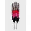 Pleated dress with an asymmetrical hem