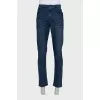 Men's dark blue jeans with leather jacron