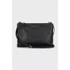 Black leather bag with a belt