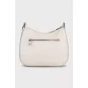 White leather bag with gold logo