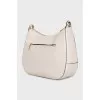 White leather bag with gold logo