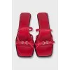 Red leather mules with heels and tag