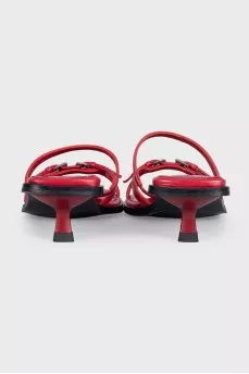Red leather mules with heels and tag