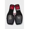 Red leather mules with heels and tag