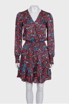 Blue fitted dress with a printed pattern