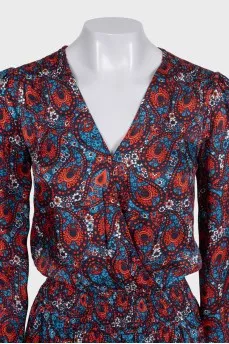 Blue fitted dress with a printed pattern