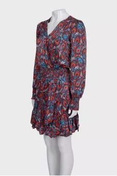 Blue fitted dress with a printed pattern