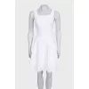 White dress with perforated skirt