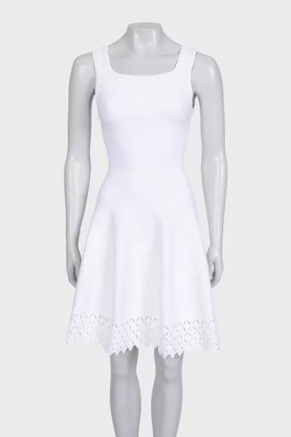 White dress with perforated skirt